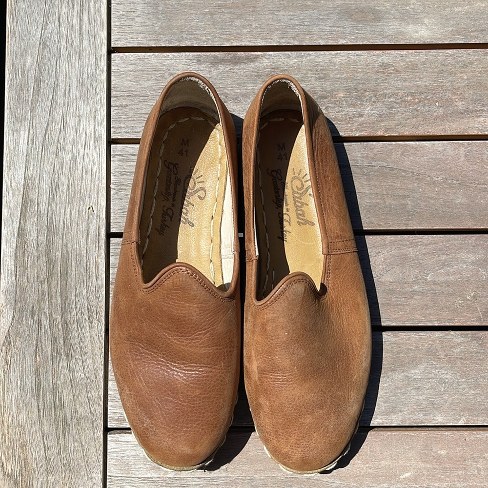 Sabah’s tan/camel leather slip-ons: like new!